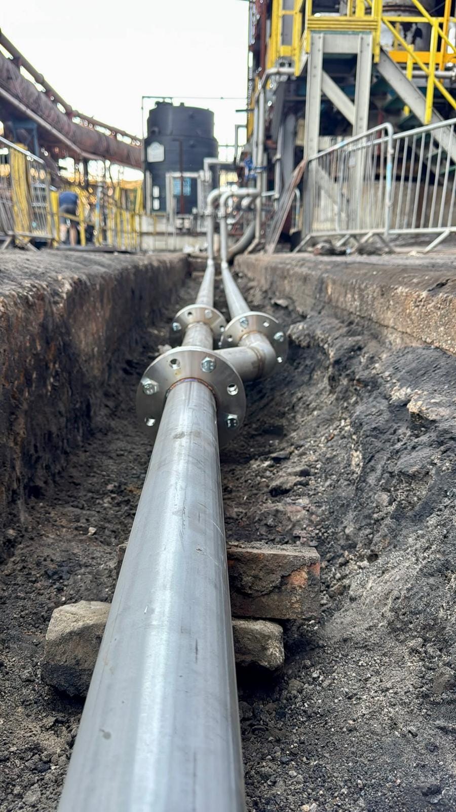 Flanged connections on the new line where it rises out of the low level pit
