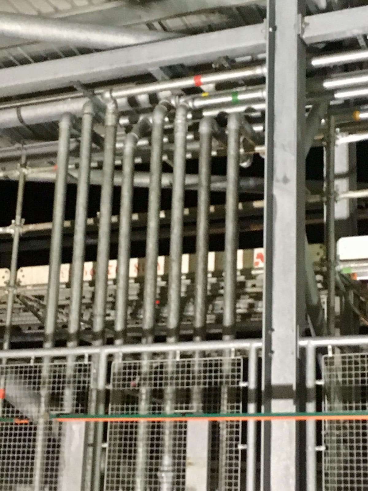 Bank of galvanised risers running floor to ceiling