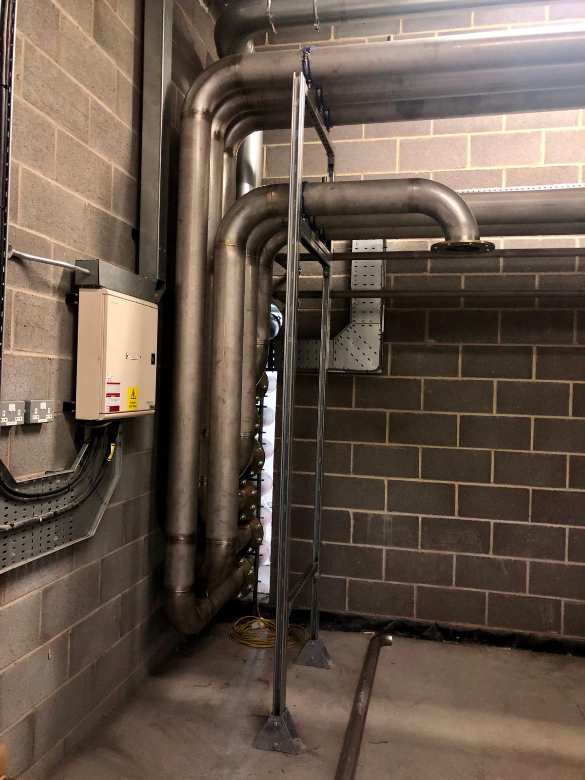 Stainless furnace cooling pipework on the Rolls-Royce site